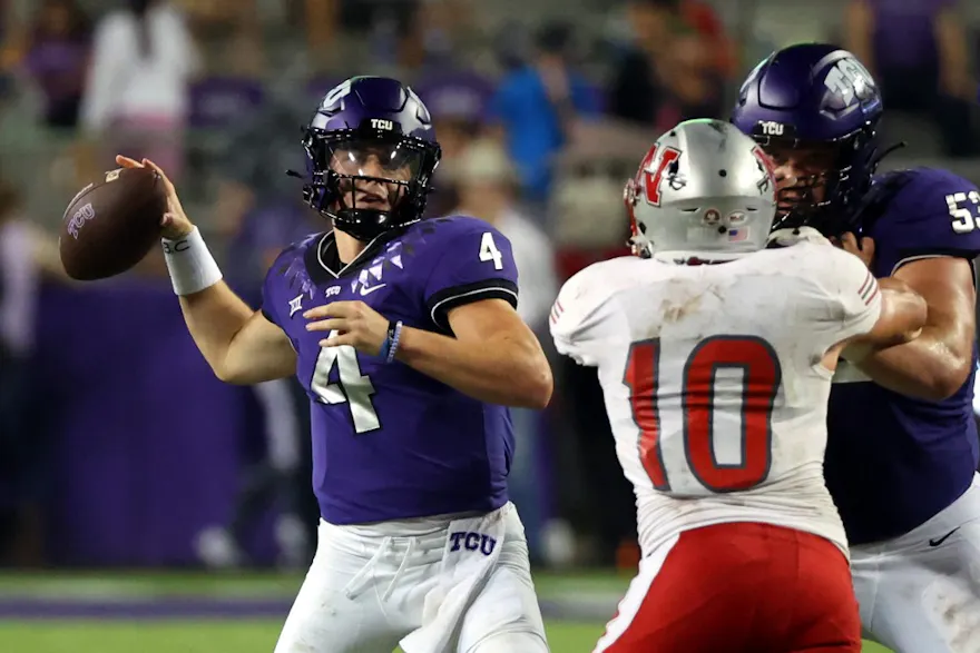 Chandler Morris of the TCU Horned Frogs passes under pressure from Hayden Shaheen of the Nicholls State Colonels at Amon G. Carter Stadium as we look at our college football upset picks.