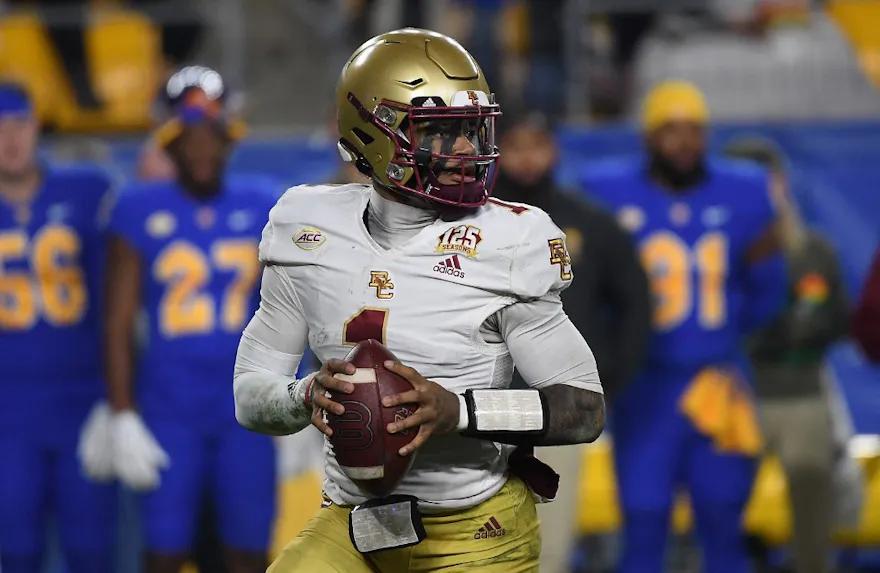 Thomas Castellanos of the Boston College Eagles drops back to pass in the first half during the game against the Pittsburgh Panthers, and we offer our top SMU vs. Boston College prediction for the Fenway Bowl based on the best NCAAF odds.