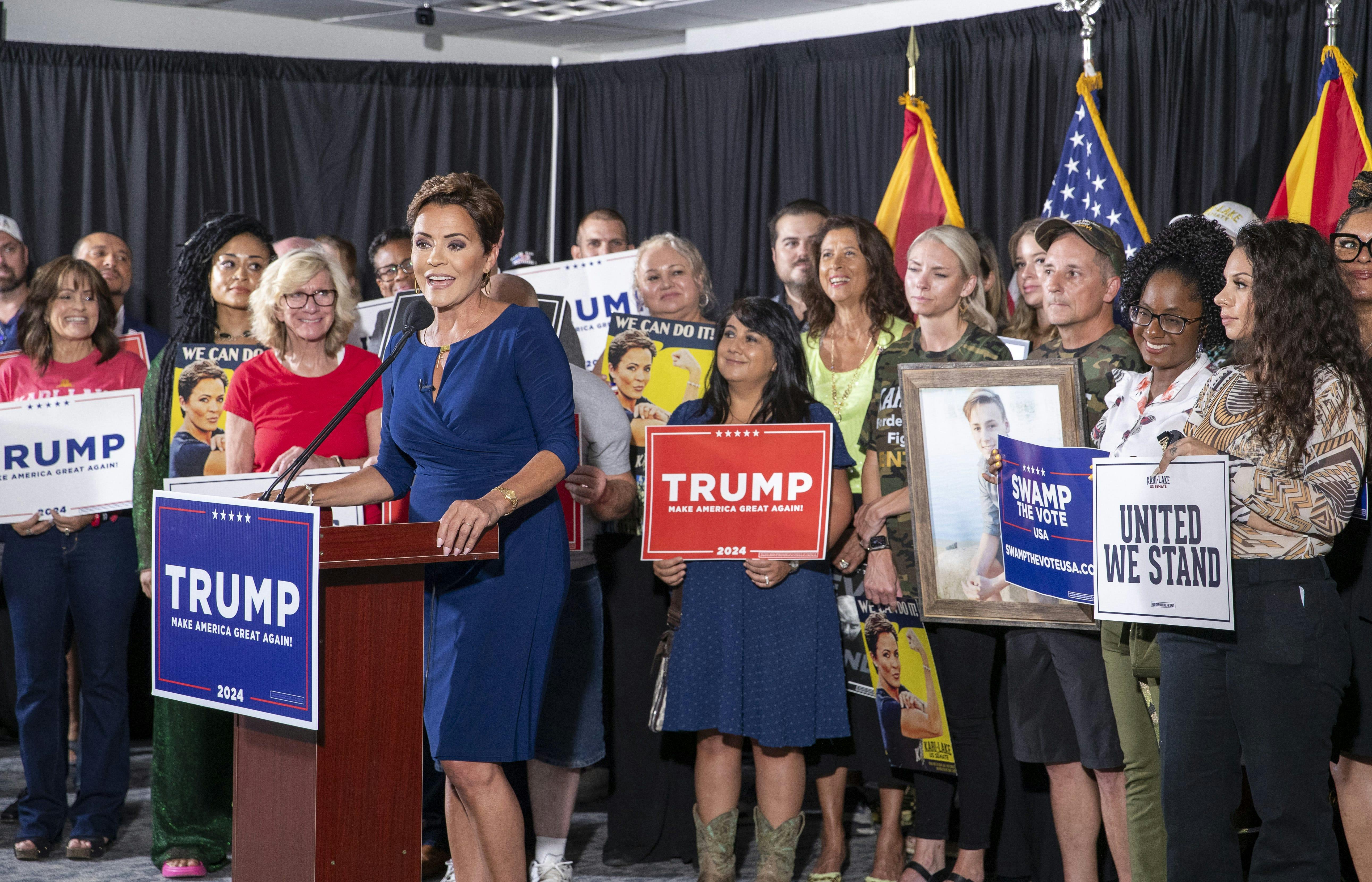 Kari Lake addresses members of the press and touts support from converted Democrats and independent voters in Chandler, Arizona, on Aug. 8, 2024.