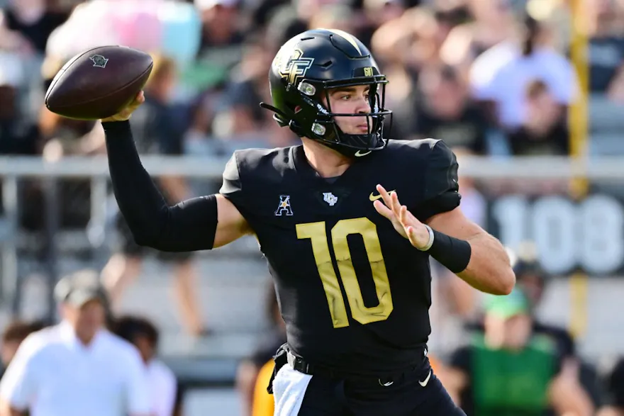 John Rhys Plumlee of the UCF Knights looks to throw a pass in the first quarter against the Cincinnati Bearcats.