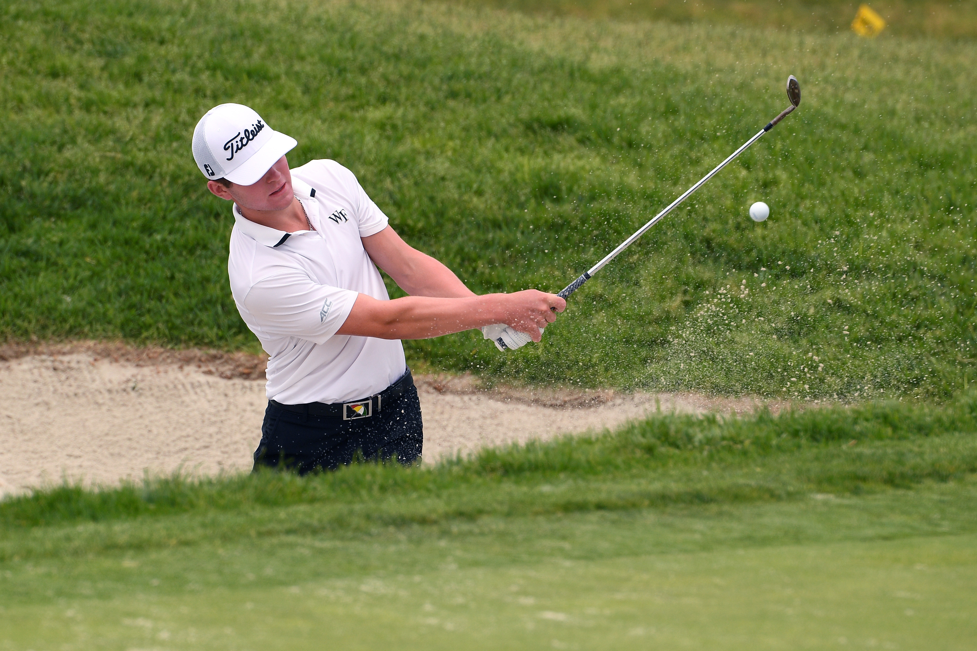 Michael Brennan plays a shot from a bunker as we provide three +10000 Odds long-shot picks to make at The American Express. 