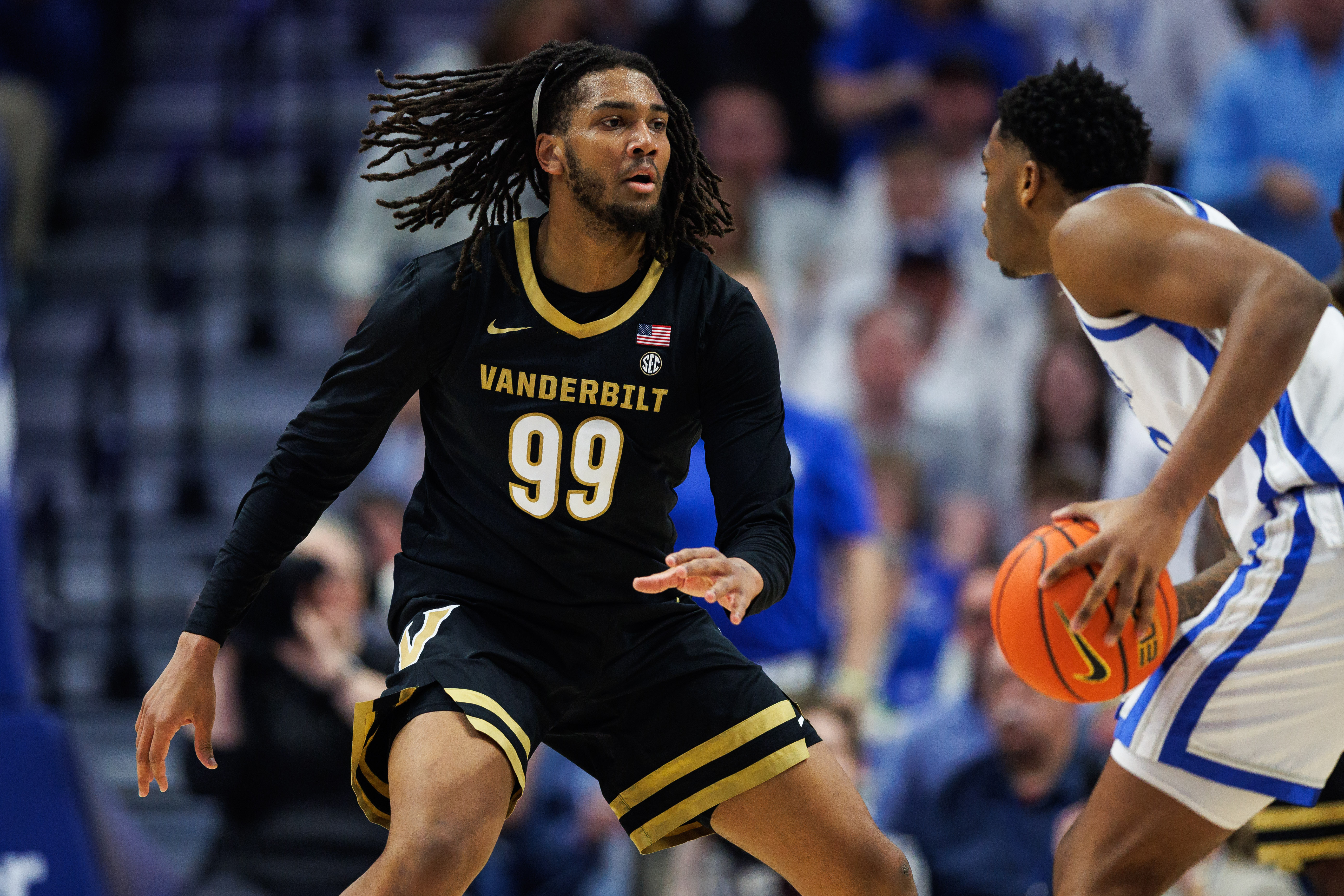 Vanderbilt Commodores forward Devin McGlockton guards as we make our best Tennessee vs. Vanderbilt prediction.