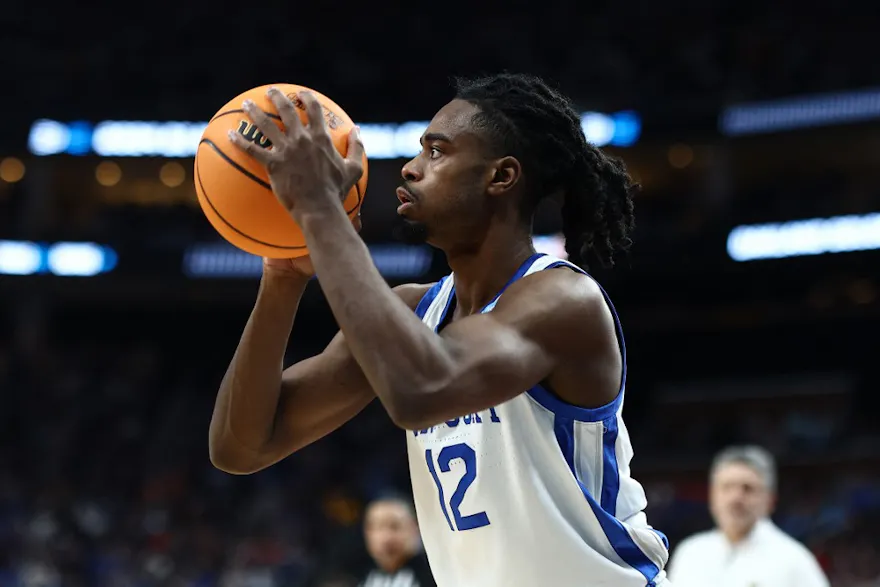 Antonio Reeves #12 of the Kentucky Wildcats shoots as we look at Kentucky's sportsbook financials for January and February 2024