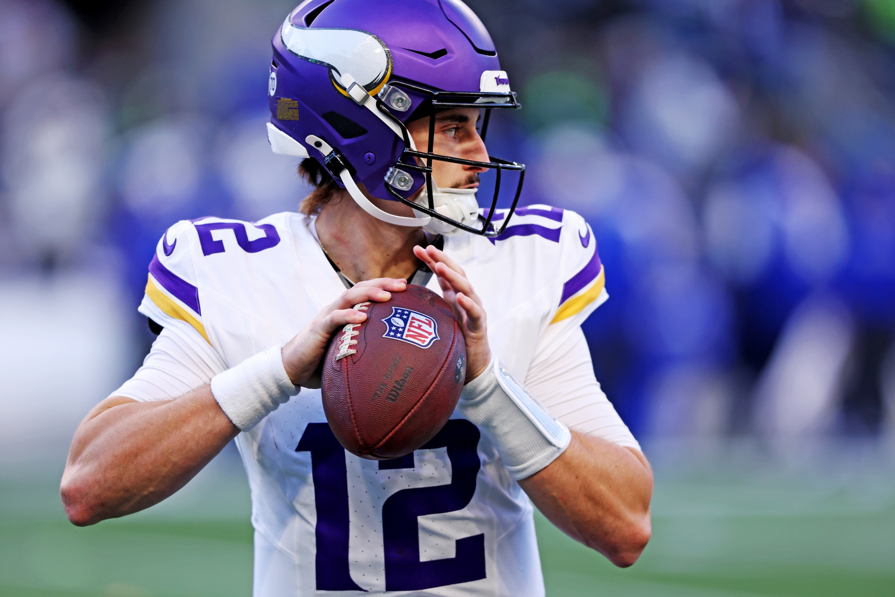 Minnesota Vikings quarterback Max Brosmer (12) drops back for a pass as he is featured in our Why Vikings undrafted rookie QB could break out vs. Lions on Christmas Day Football.
