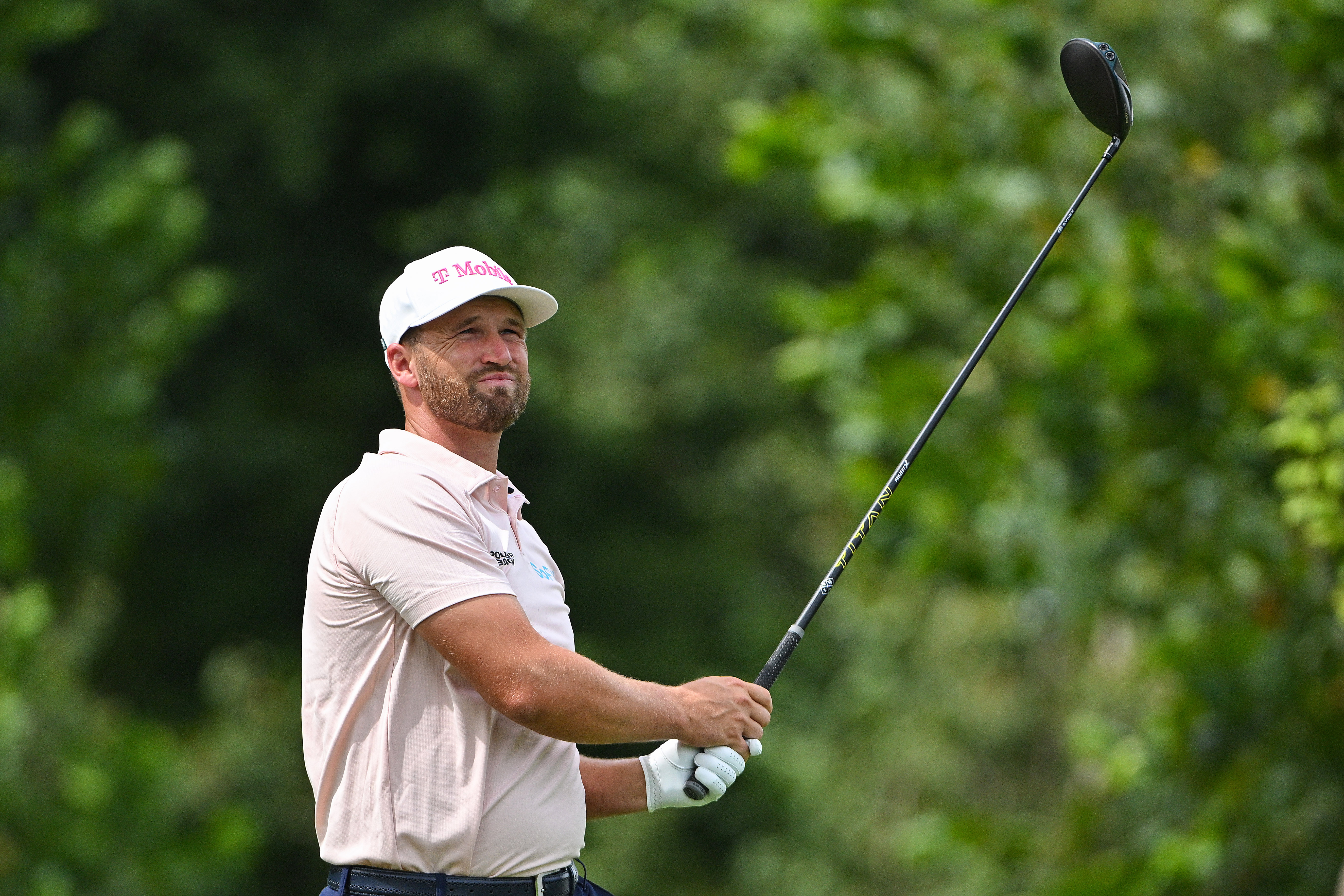 Wyndham Clark plays his shot on the eighth tee as he is featured in our TOUR Championship First-Round Leader prediction.