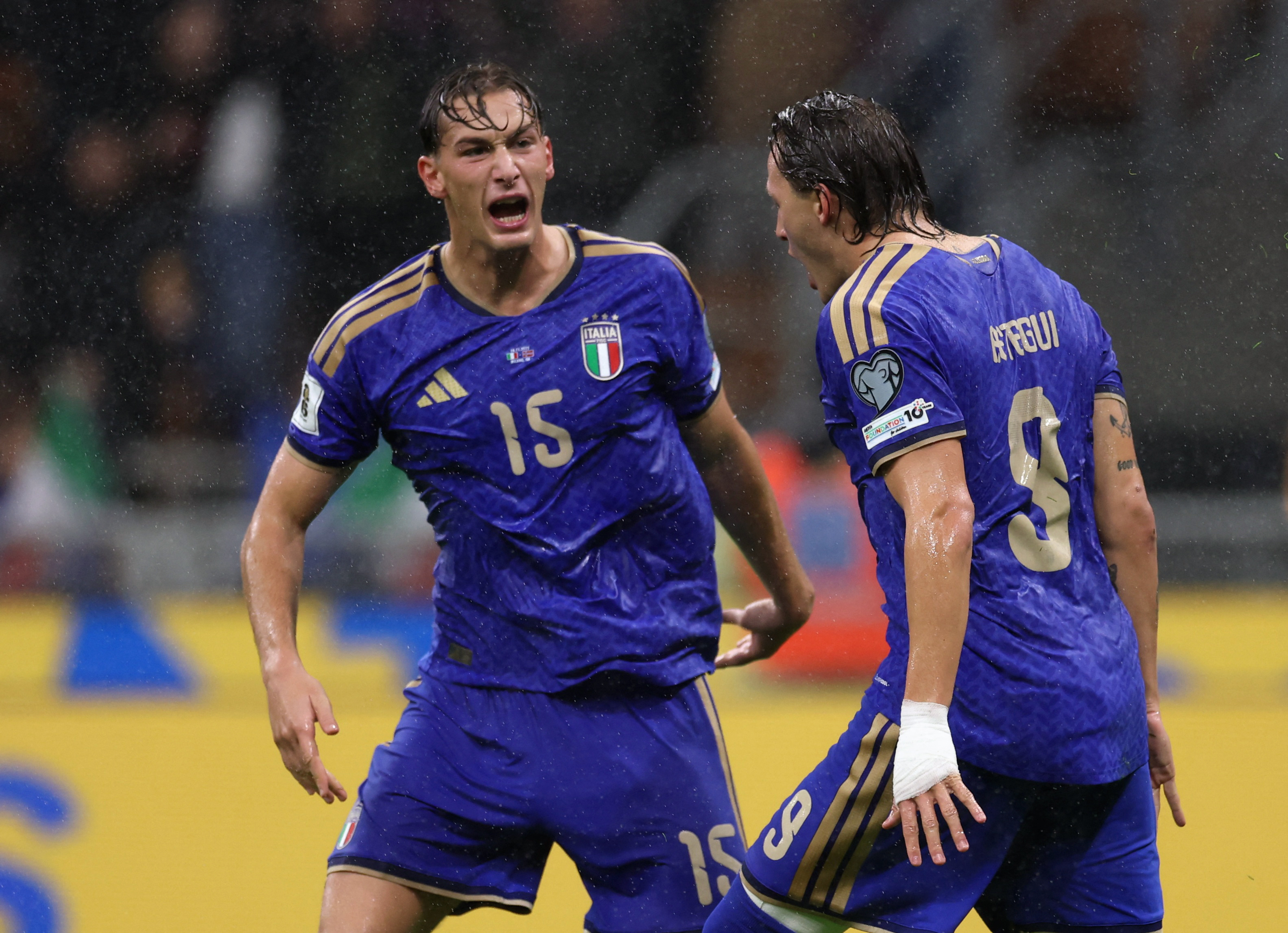 Pio Esposito and Mateo Retegui celebrate scoring a goal as we provide our Italy vs. Northern Ireland predictions and odds.