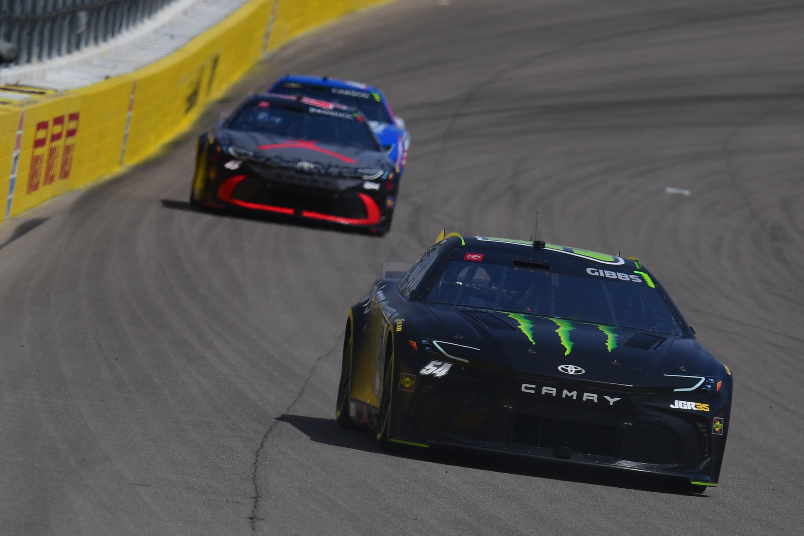 Joe Gibbs Racing driver Ty Gibbs (54) leads 23XI Racing driver Tyler Reddick (45) as we offer our NASCAR predictions for the Goodyear 400.