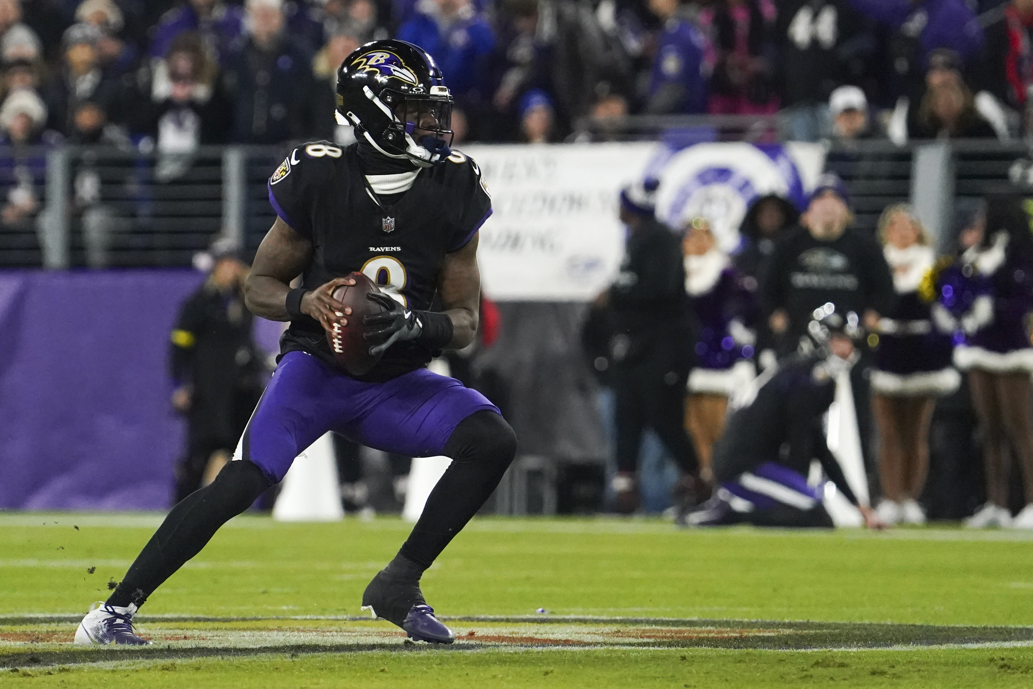Baltimore Ravens quarterback Lamar Jackson (8) looks to pass, as we look at our NFL predictions for Week 18