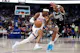 Shai Gilgeous-Alexander of the Oklahoma City Thunder drives to the basket against P.J. Washington of the Dallas Mavericks during Game 4 of the NBA playoffs. We're backing Gilgeous-Alexander in our Mavericks vs. Thunder Player Props. 