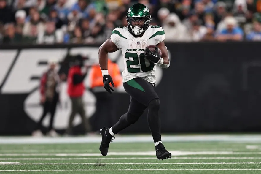 Breece Hall of the New York Jets runs with the ball during the second half against the Los Angeles Chargers, and we offer new U.S. bettors our exclusive BetRivers bonus code.