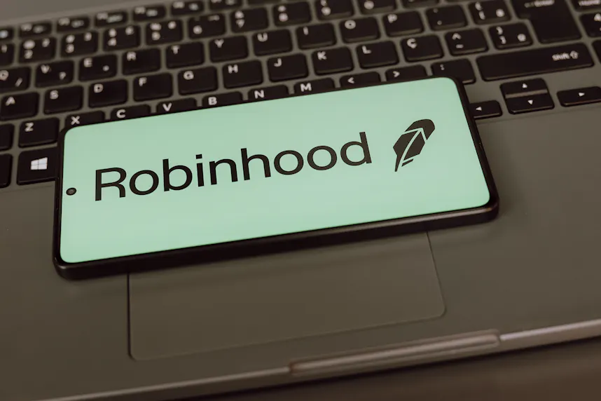 In this photo illustration, the Robinhood Markets, Inc. logo is displayed on a smartphone screen as we look at the company considering entering the sports betting market.