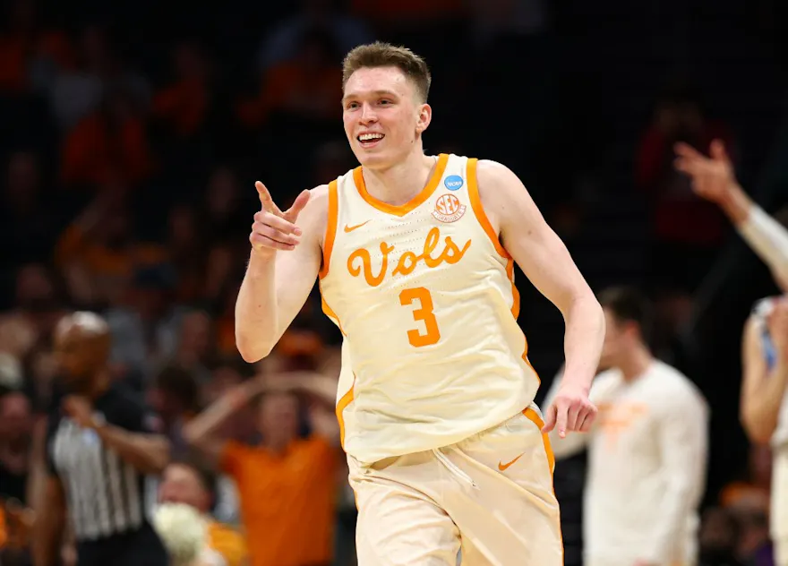 Dalton Knecht of the Tennessee Volunteers reacts against the Saint Peter's Peacocks in the first round of the NCAA Men's Basketball Tournament. We expect Knecht to lead the Vols to a big win in our Texas vs. Tennessee picks and best bet.