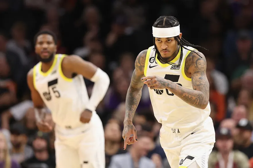 Jordan Clarkson #00 of the Utah Jazz reacts to a three-point shot against the Phoenix Suns during the first half of NBA game at Footprint Center on November 26, 2022 in Phoenix, Arizona.