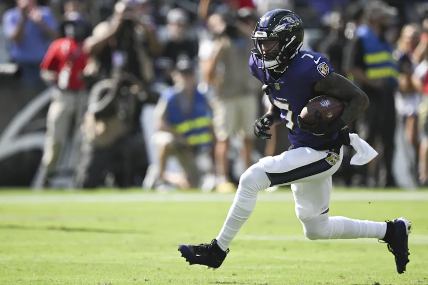 Baltimore Ravens wide receiver Rashod Bateman runs after a catch as we offer our Ravens vs. Buccaneers prediction.