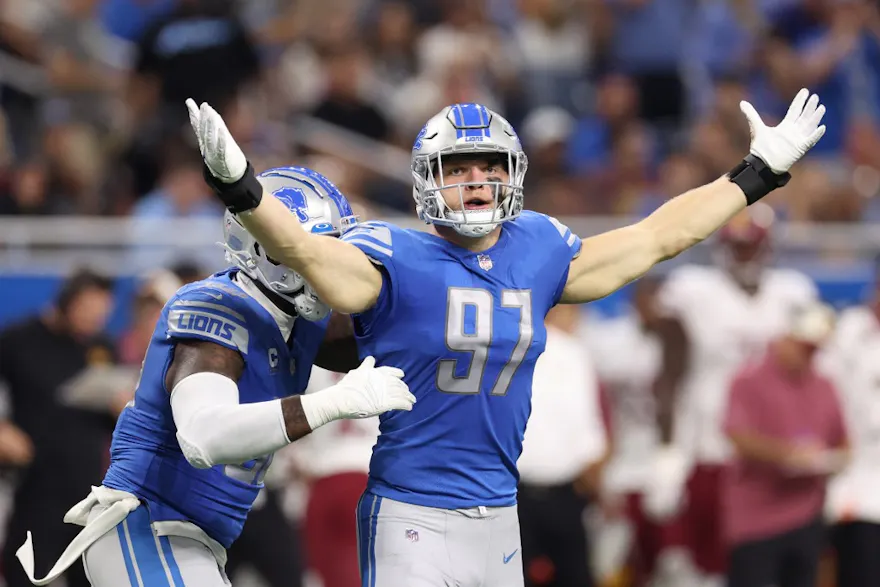 Aidan Hutchinson of the Detroit Lions celebrates his first career sack in the NFL while playing the Washington Commanders, and we offer new U.S. bettors our exclusive BetRivers promo code for Lions vs. Chiefs.