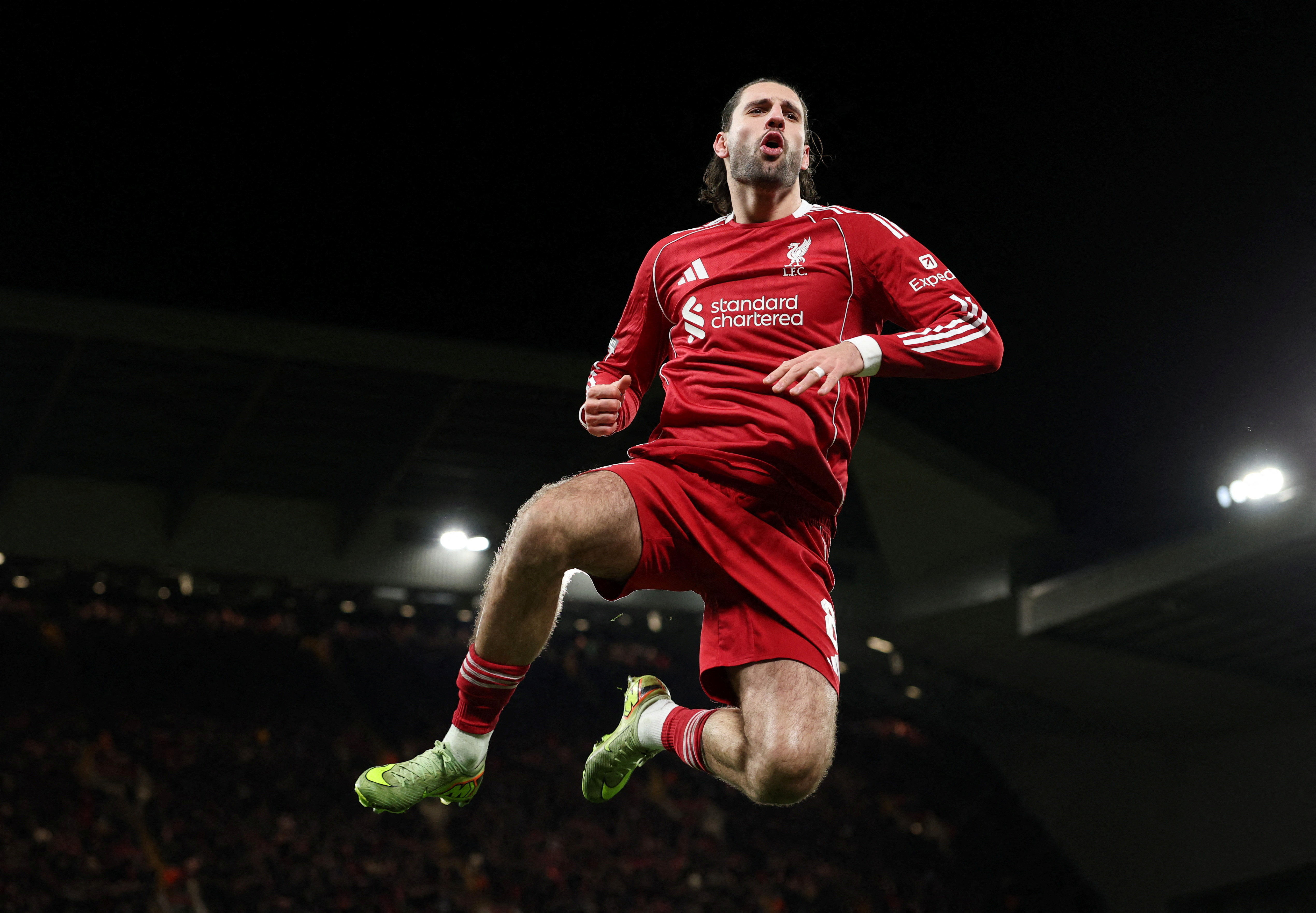 Liverpool's Dominik Szoboszlai celebrates as we make our best Wolves vs. Liverpool prediction.