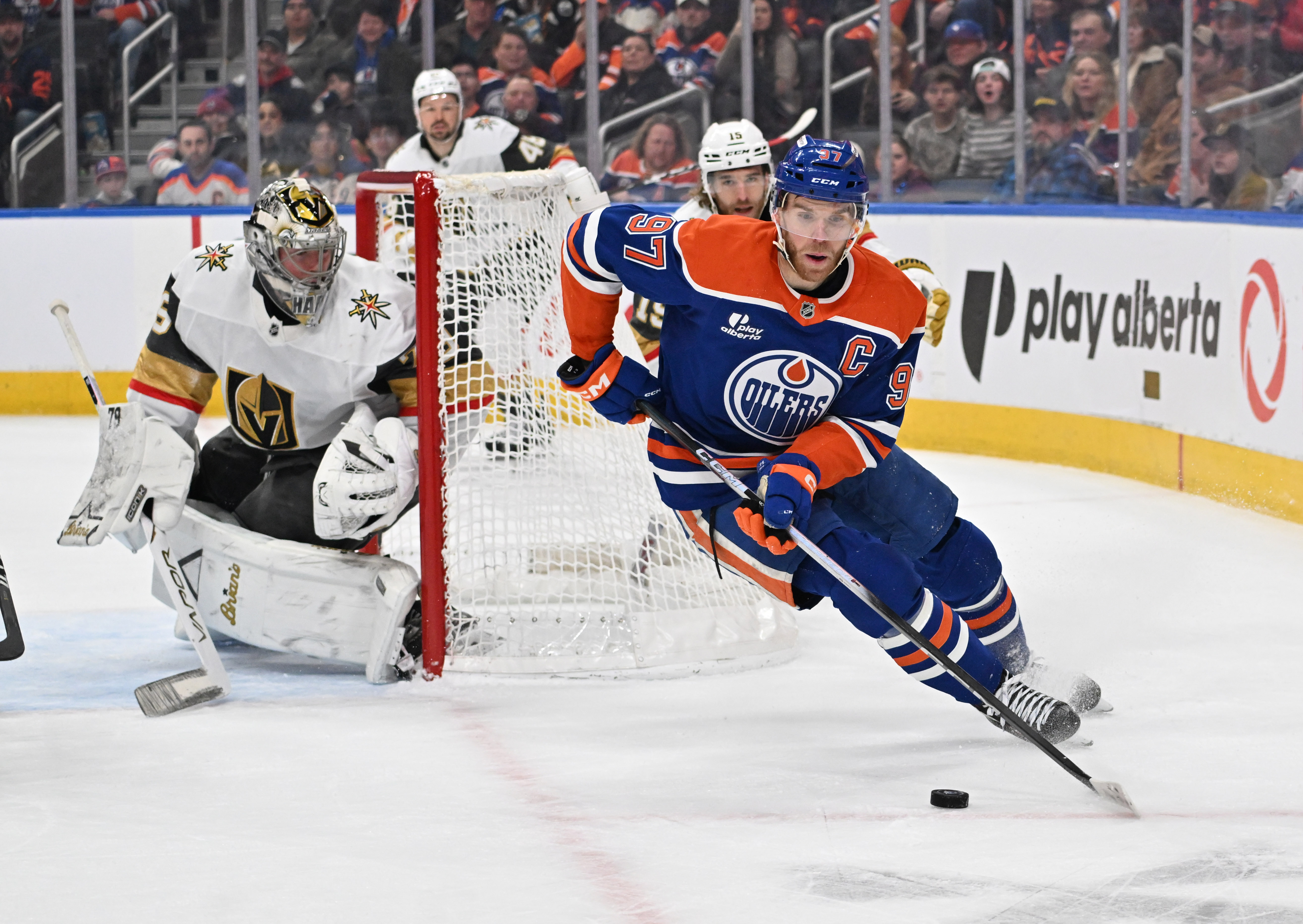 Edmonton Oilers center Connor McDavid (97) skates with the puck as we offer our NHL player props tonight.
