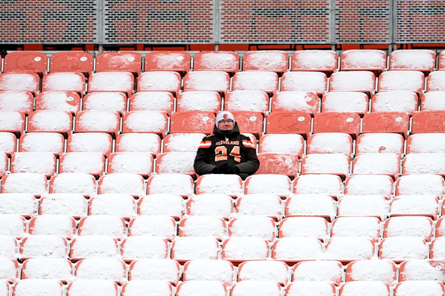 A Cleveland Browns fan sits in the stands during the game against the New Orleans Saints at FirstEnergy Stadium on December 24, 2022. Photo by Nick Cammett Getty Images via AFP.