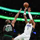 Paolo Banchero of the Orlando Magic attempts a basket against Al Horford #42 of the Boston Celtics during the first quarter at the TD Garden on December 18, 2022 in Boston, Massachusetts.