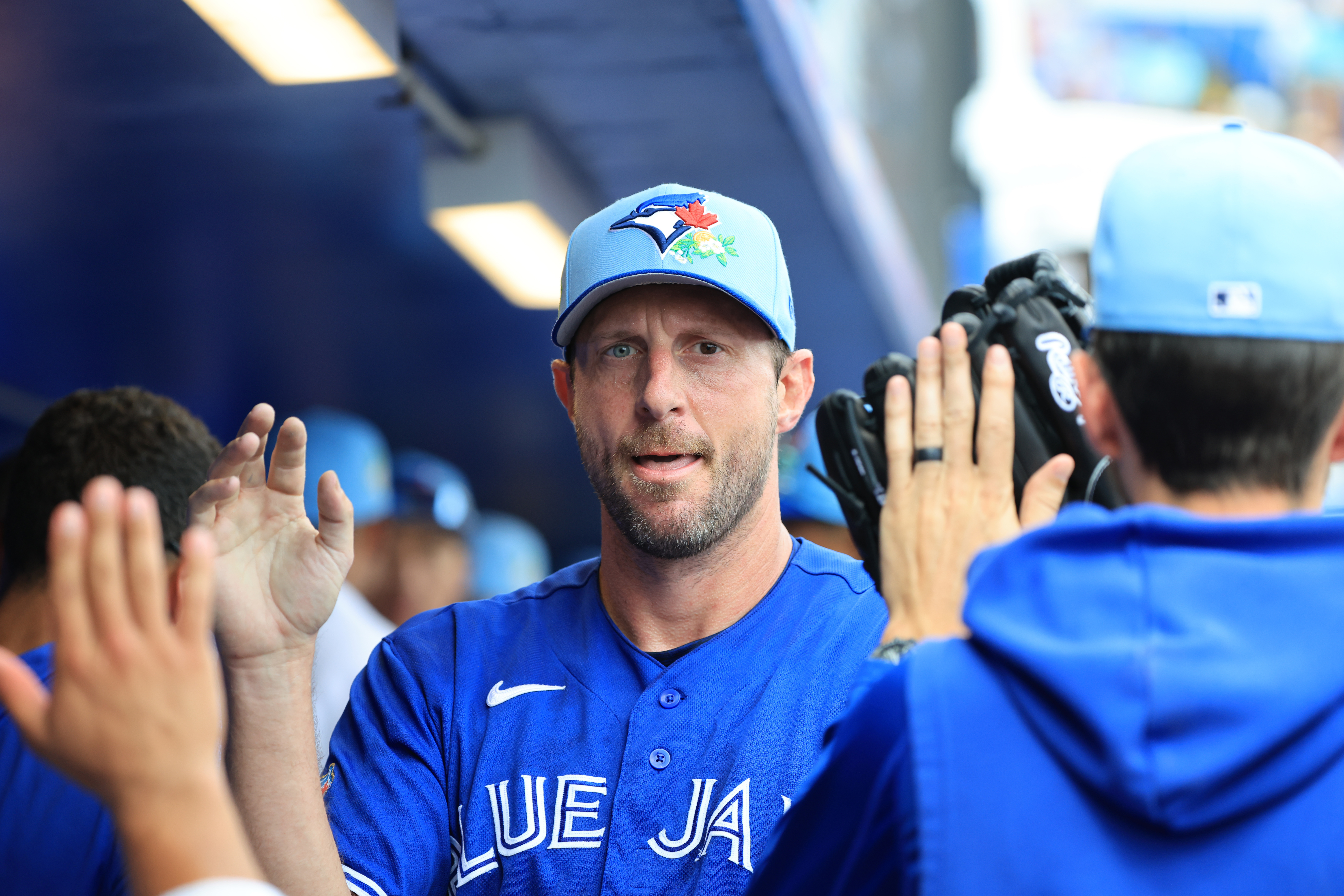 Toronto Blue Jays starting pitcher Max Scherzer - who's featured in my best NRFI bets today - is congratulated in the dugout.