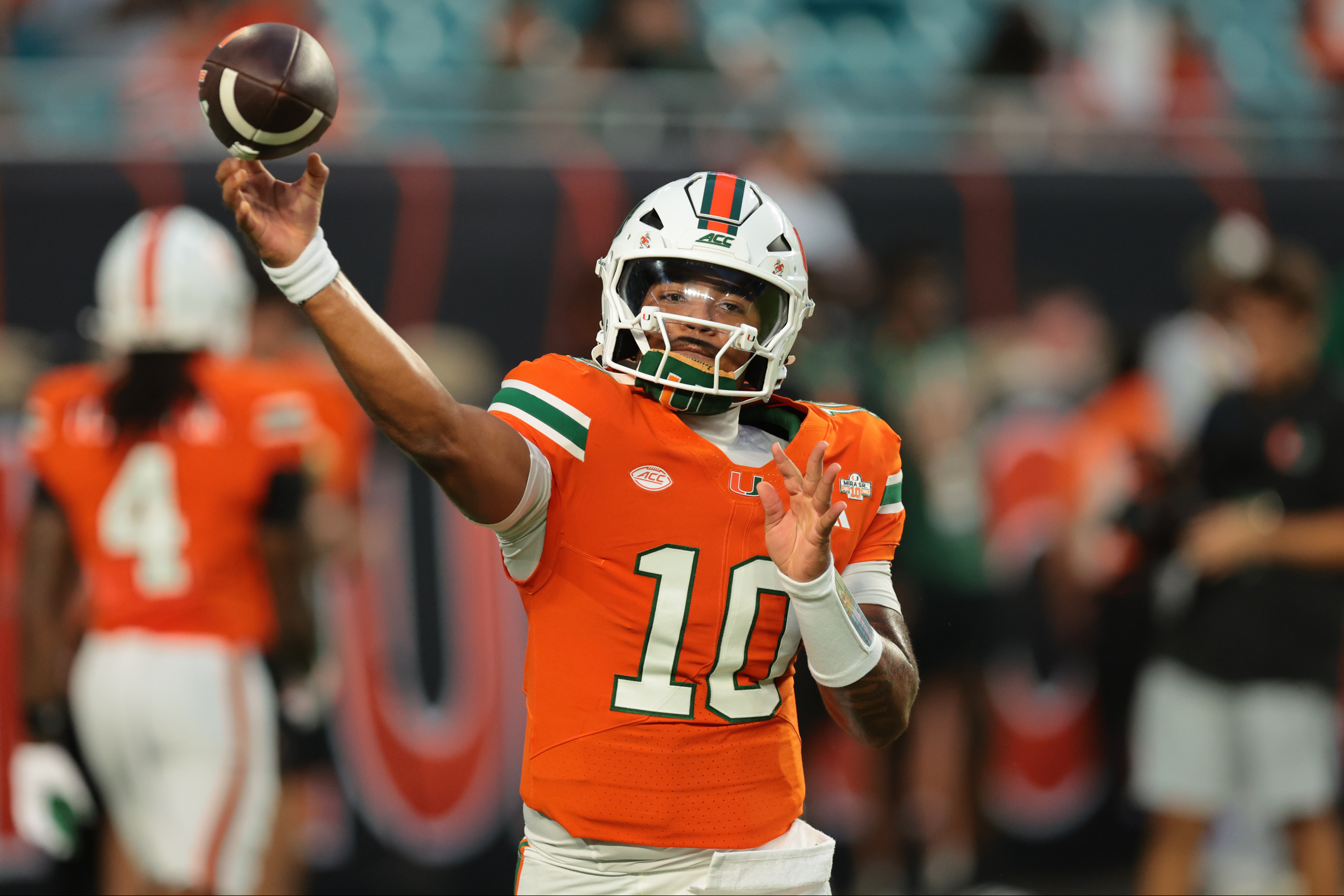 Miami QB Dariah Mensah in action as we break down our College Football Week 3 AI Predictions. Photo by Sam Navarro-Imagn Images.