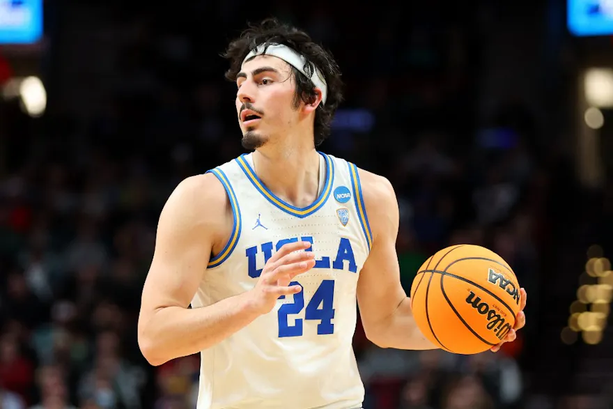 Jaime Jaquez Jr. of the UCLA Bruins controls the ball against the Akron Zips in the first round game of the 2022 NCAA Men's Basketball Tournament at Moda Center on March 17, 2022 in Portland, Oregon. 