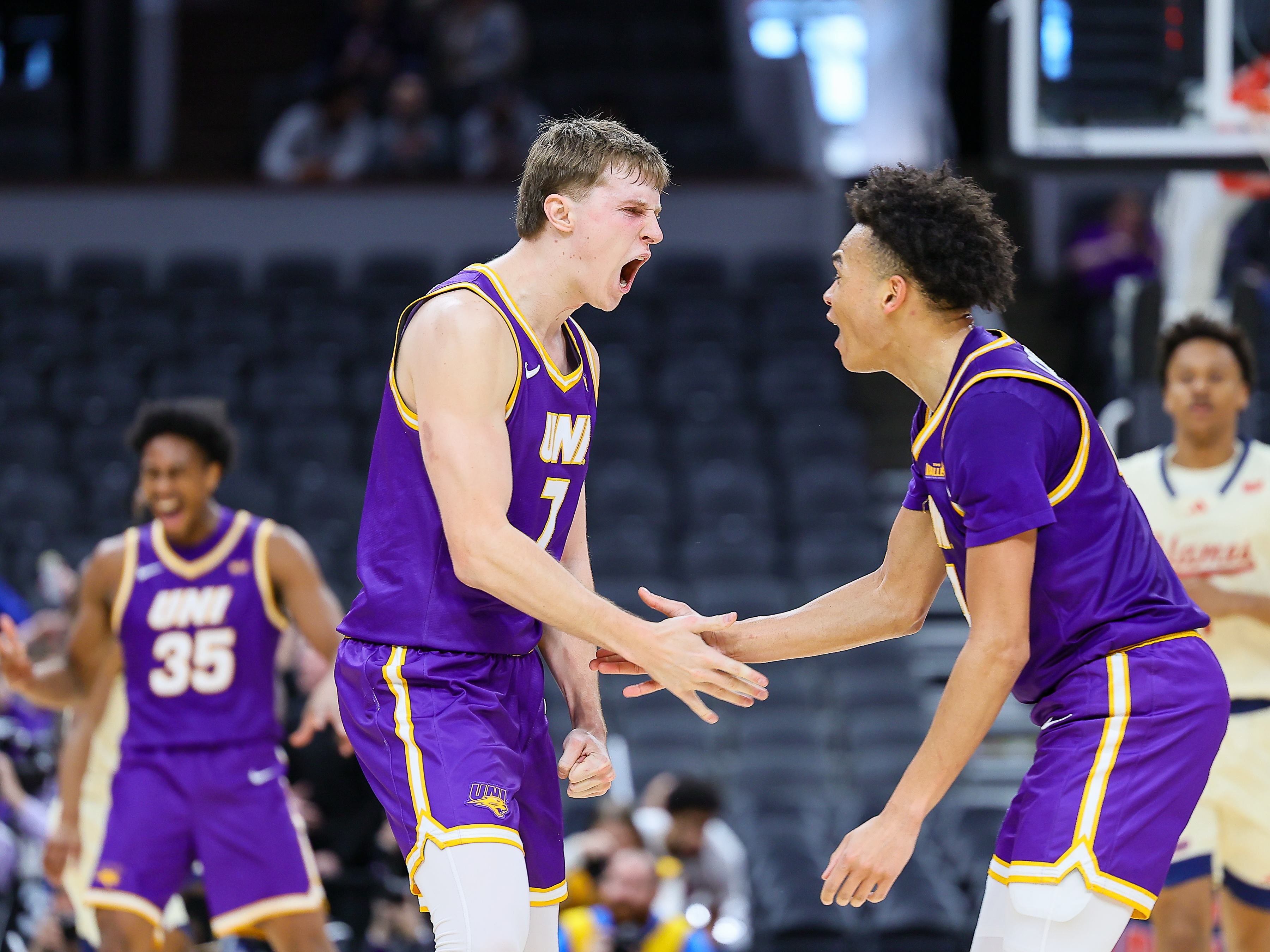 Northern Iowa's Ben Schwieger and Trey Campbell get pumped after a play as we make our best March Madness long shot plays and sleeper picks.