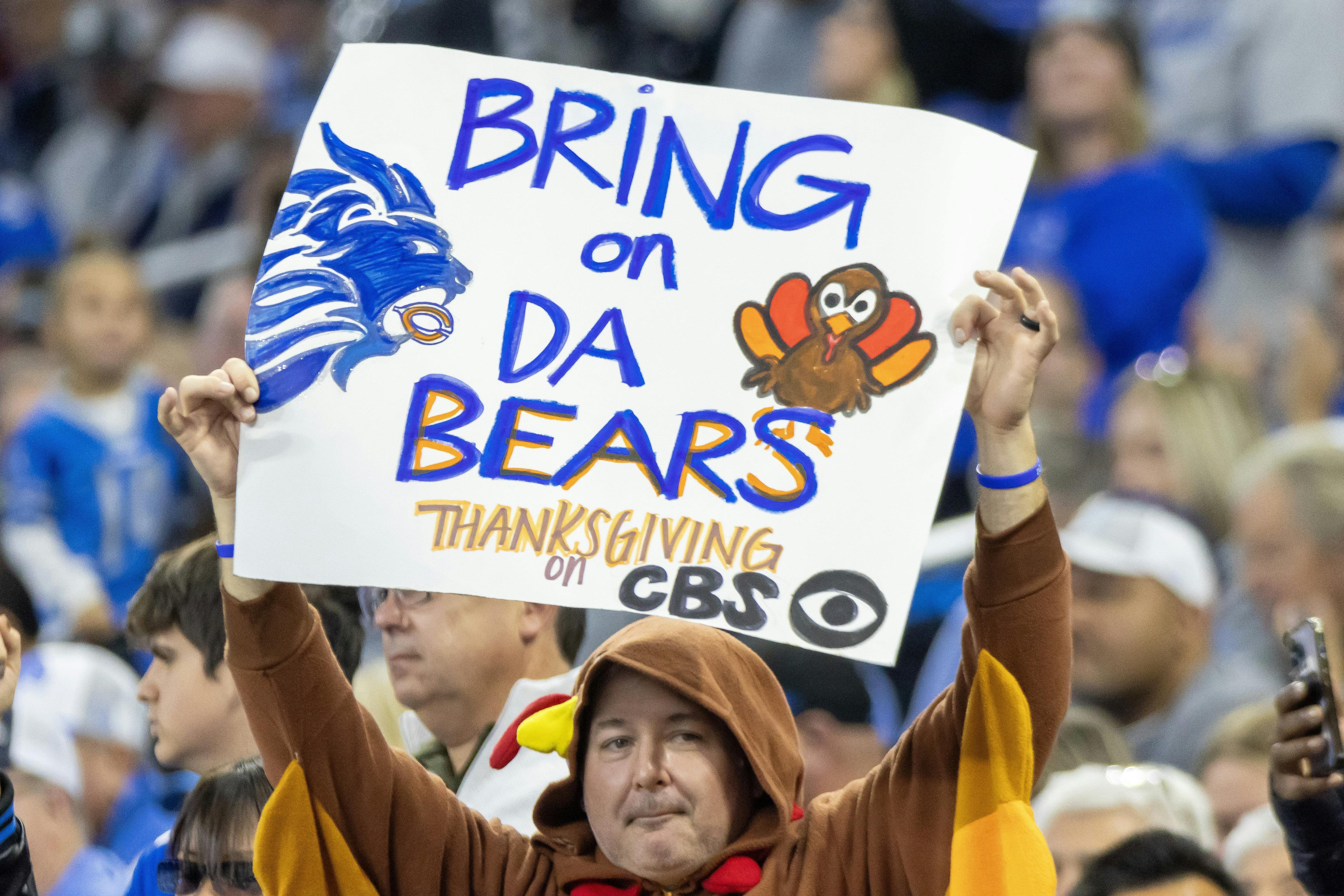 A fan dressed as a turkey looks forward to the Thanksgiving Day game as we look at Week 13 odds & betting lines. 