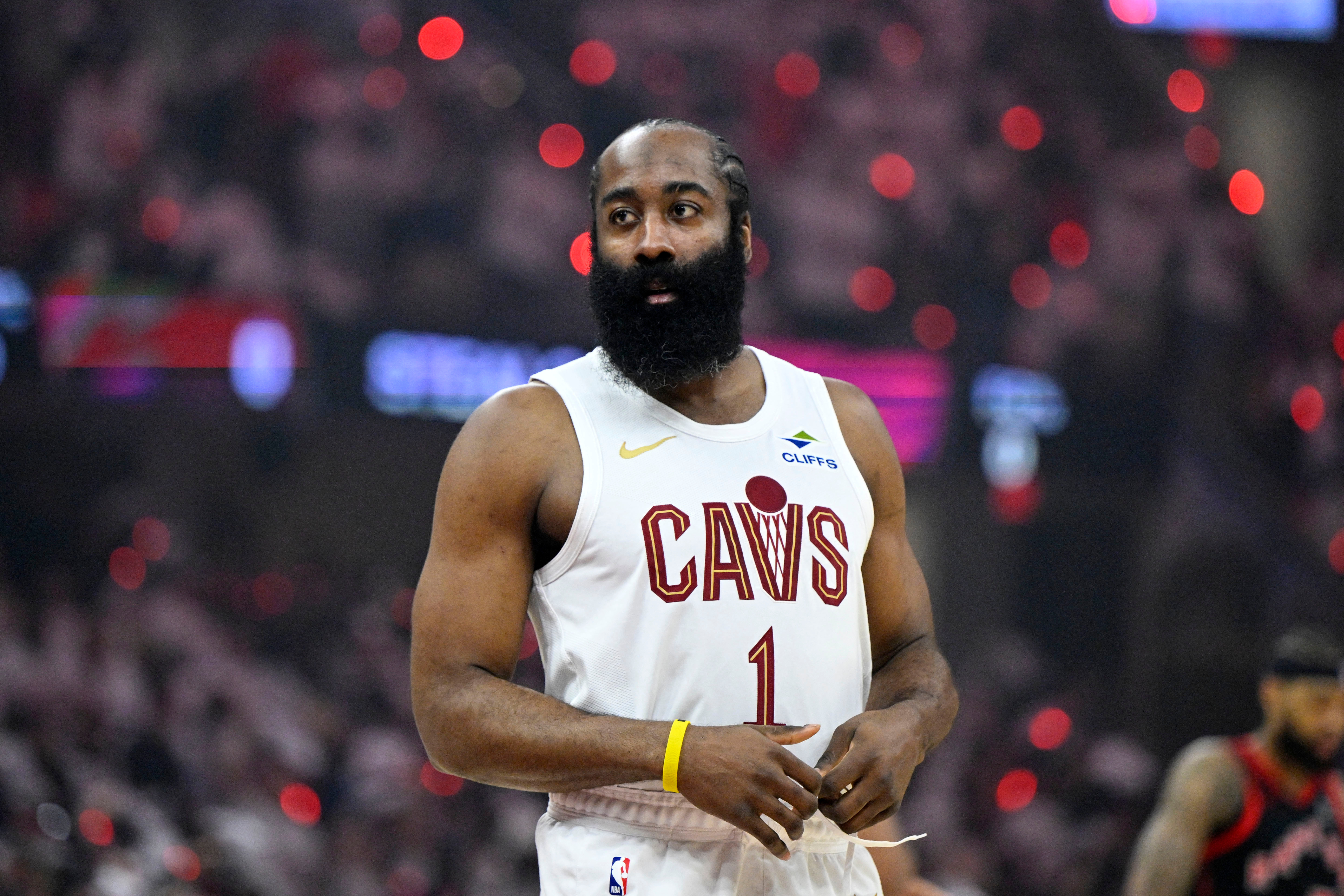 Cleveland Cavaliers guard James Harden (1), seen here standing on the court, is featured in our Cavaliers vs. Raptors player props for Game 6 today.