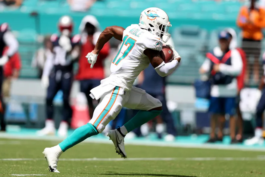 Jaylen Waddle #17 of the Miami Dolphins scores a touchdown after catching a pass from Quarterback Tua Tagovailoa #1 of the Miami Dolphins in the second quarter of the game at Hard Rock Stadium on Sept. 11.