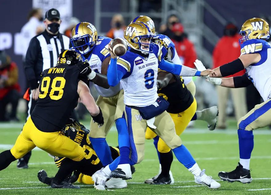 Zach Collaros of the Winnipeg Blue Bombers throws the ball against the Hamilton Tiger-Cats at Tim Hortons Field on Dec. 12, 2021. 