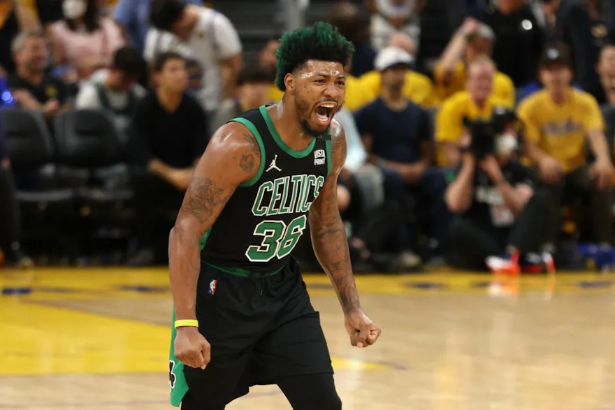 Marcus Smart of the Boston Celtics celebrates a play during the third quarter against the Golden State Warriors in Game 5 of the 2022 NBA Finals. Photo by Ezra Shaw/Getty Images via AFP.