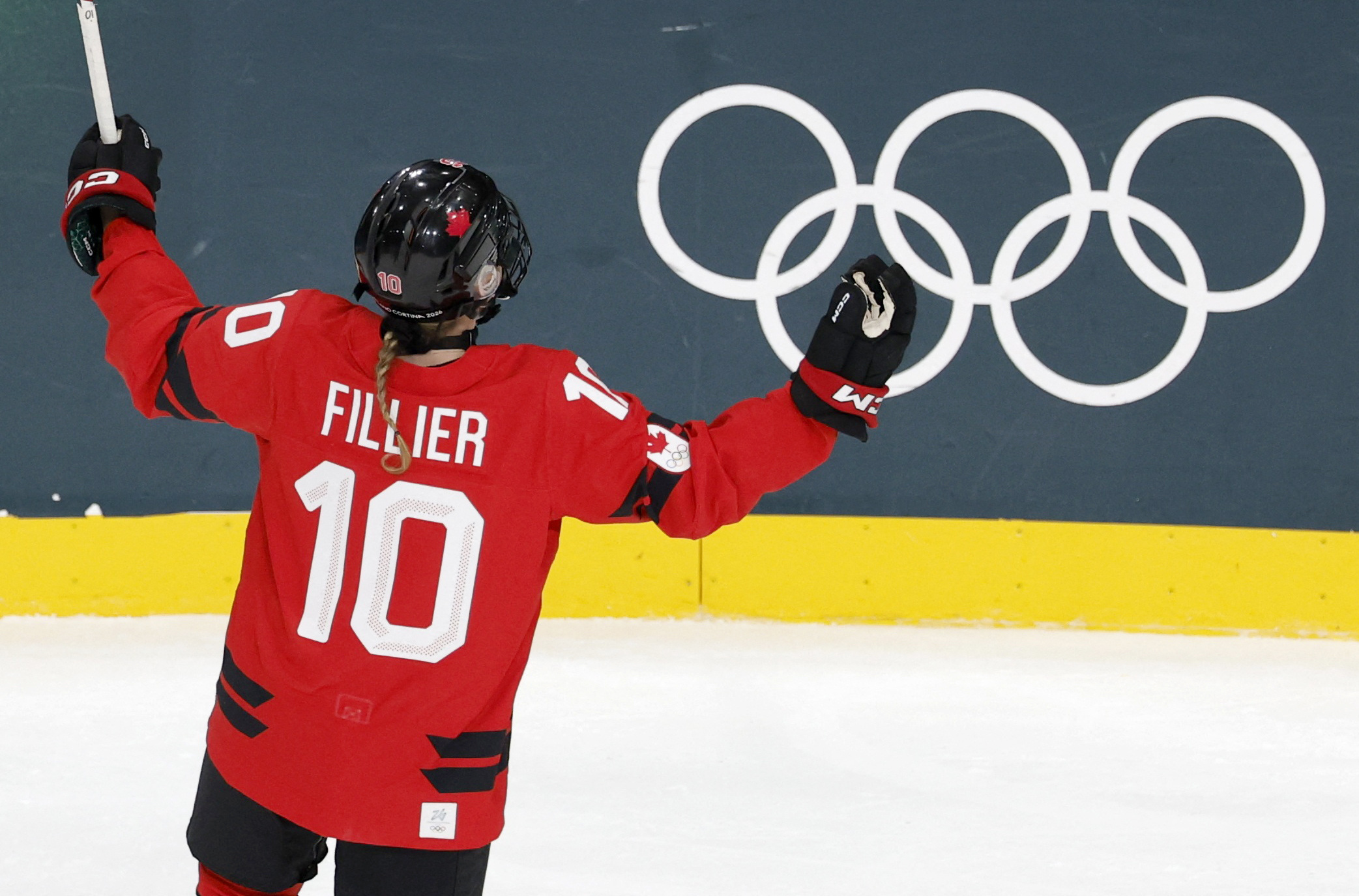 Sarah Fillier of Canada celebrates scoring as we make our best Canada vs. Finland prediction.