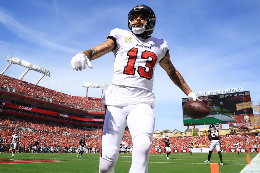 Mike Evans #13 of the Tampa Bay Buccaneers looks on as we look at our Buccaneers vs. Bills Player Props for Thursday Night Football.
