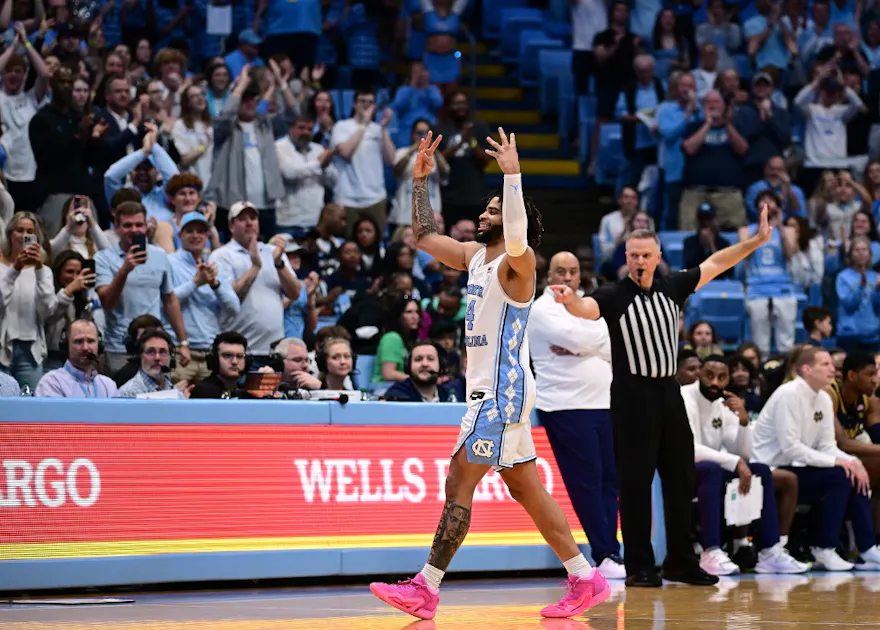 Senior RJ Davis of the North Carolina Tar Heels salutes the fans as he leaves the floor for the final time in Chapel Hill, North Carolina. Sportsradar has been officially licensed in North Carolina ahead of sports gambling being legalized.