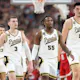 Braden Smith, Lance Jones, and Zach Edey of the Purdue Boilermakers walk across the court against the NC State Wolfpack in the NCAA Men's Basketball Tournament Final Four. We're breaking down Purdue in our 2024 National Championship Game Odds.
