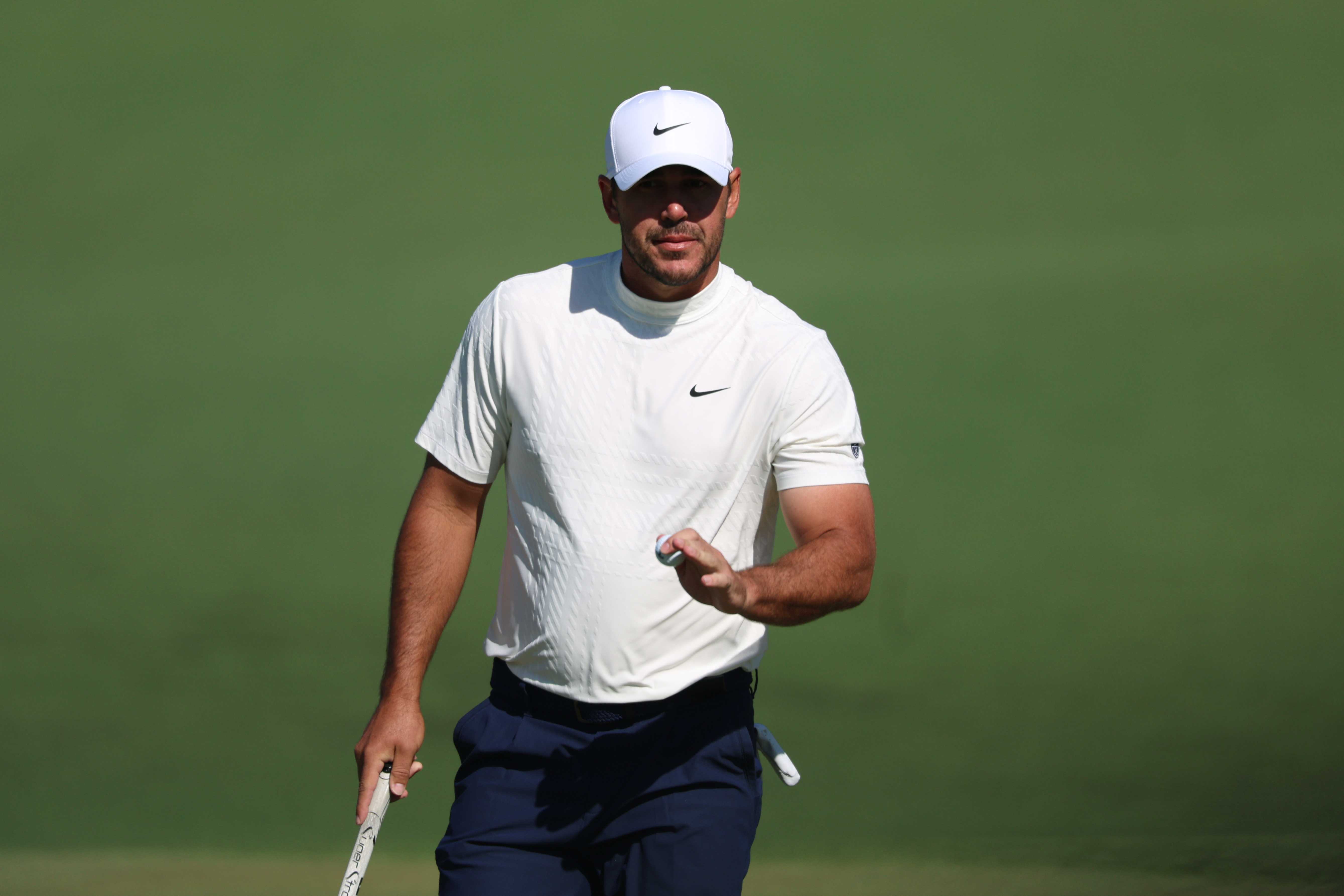 Brooks Koepka reacts after putting as he is featured in our Myrtle Beach Classic odds.