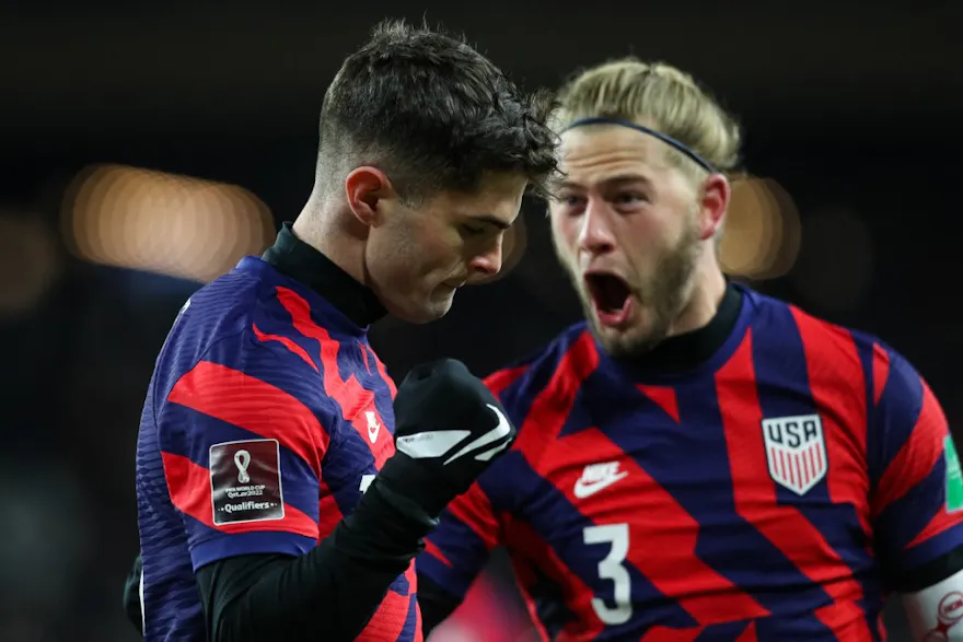 Christian Pulisic celebrates with Walker Zimmerman of the United States after scoring a goal against Honduras in the second half of a World Cup qualifying game.