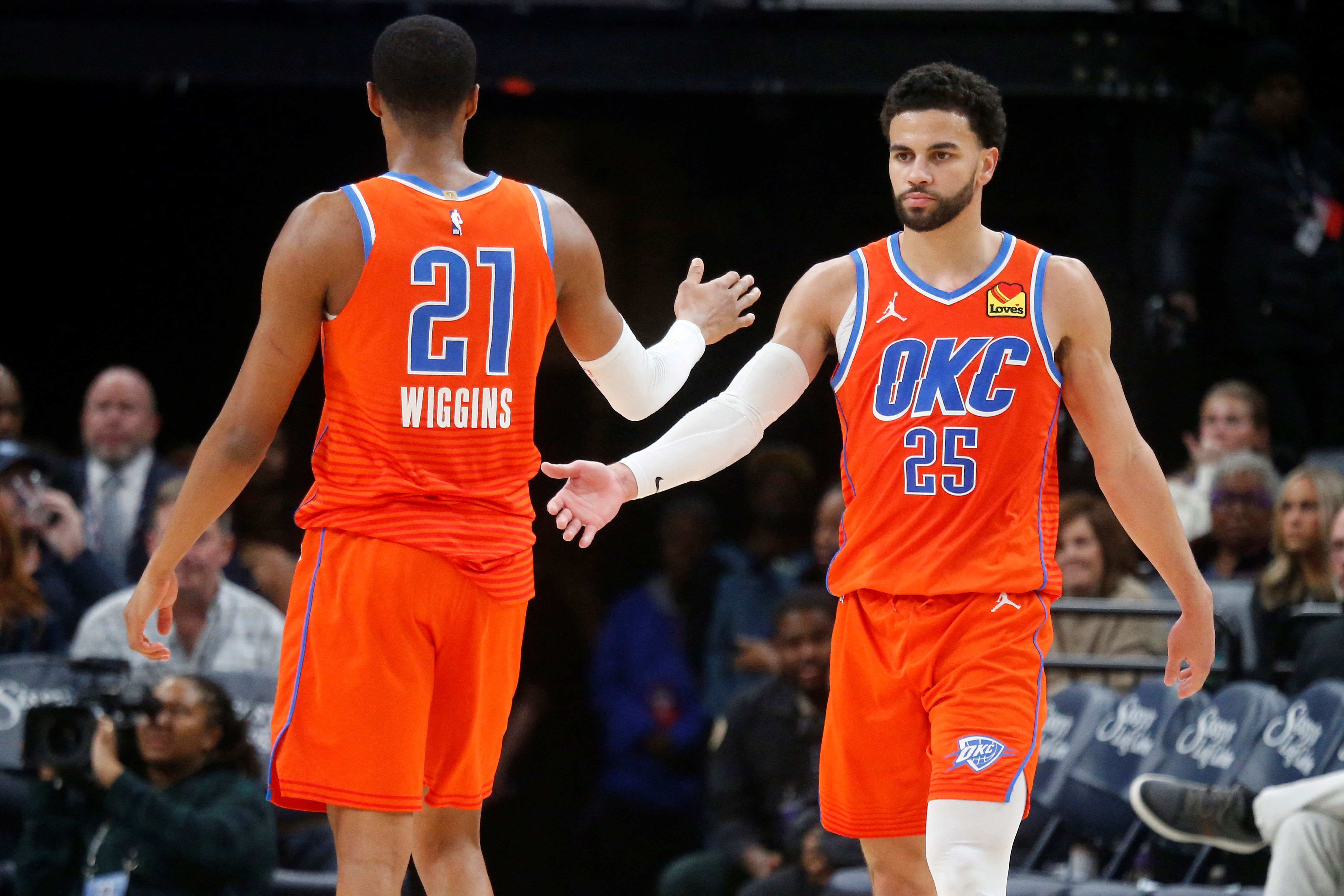 Oklahoma City Thunder guard Ajay Mitchell reacts with guard Aaron Wiggins, and they're key to our Knicks vs. Thunder player props.