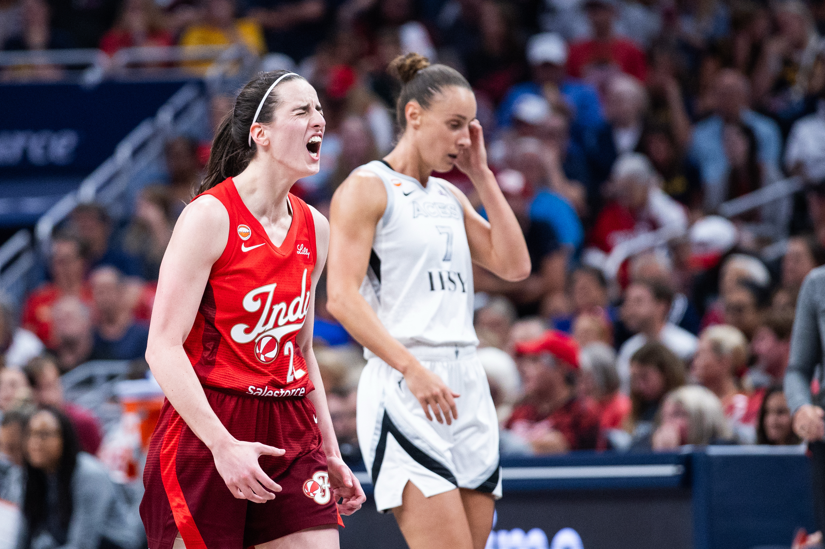 Fever guard Caitlin Clark (22) reacts as we break down our Fever vs. Aces prediction.