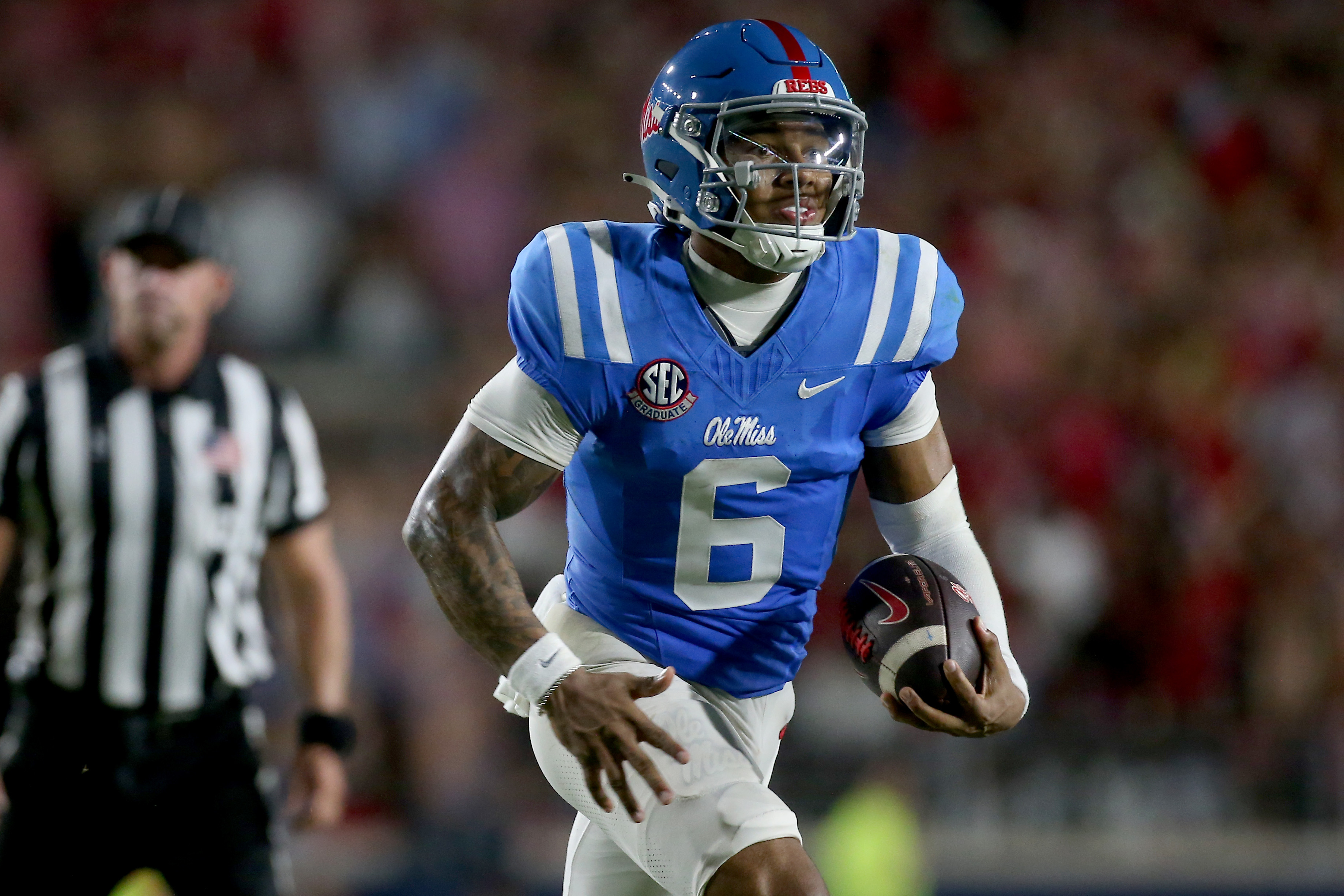 Mississippi Rebels quarterback Trinidad Chambliss (6) runs the ball as he is featured in our Ole Miss vs. Vanderbilt prediction.