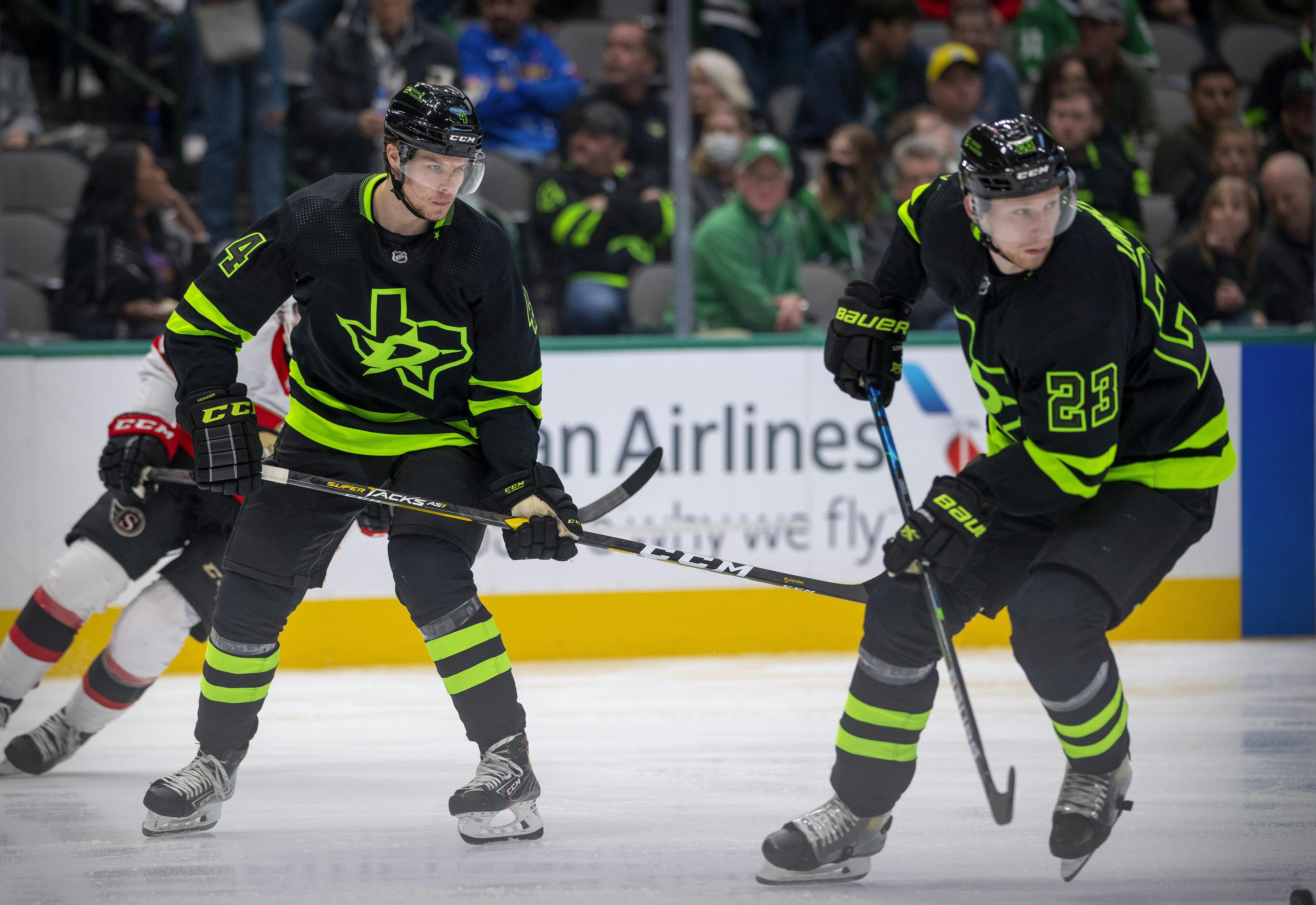 Dallas Stars defenseman Miro Heiskanen and defenseman Esa Lindell in action