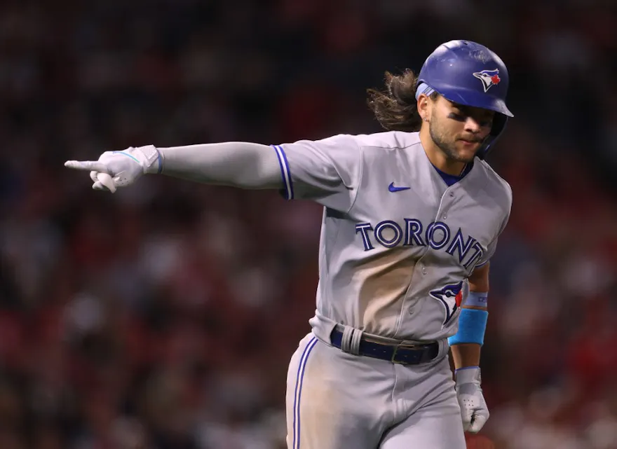Bo Bichette of the Toronto Blue Jays celebrates his three-run homerun as we look at Tuesday's MLB player props.