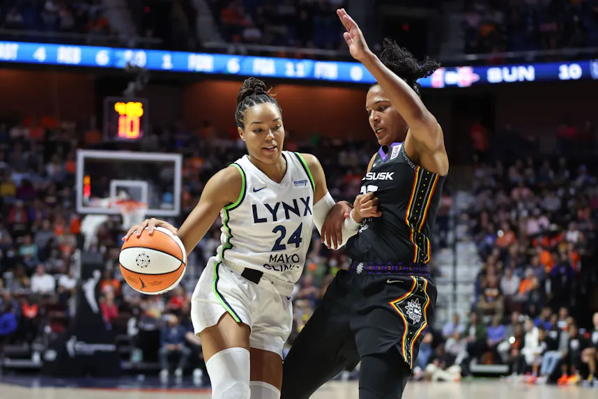 Minnesota Lynx forward Napheesa Collier (24) drives to the basket as we offer our best Sun vs. Lynx prediction, expert picks, and WNBA odds for Game 5.