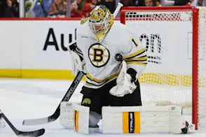 Boston Bruins goaltender Jeremy Swayman makes a save as we look at Massachusetts issuing a cease-and-desist to Bovada.
