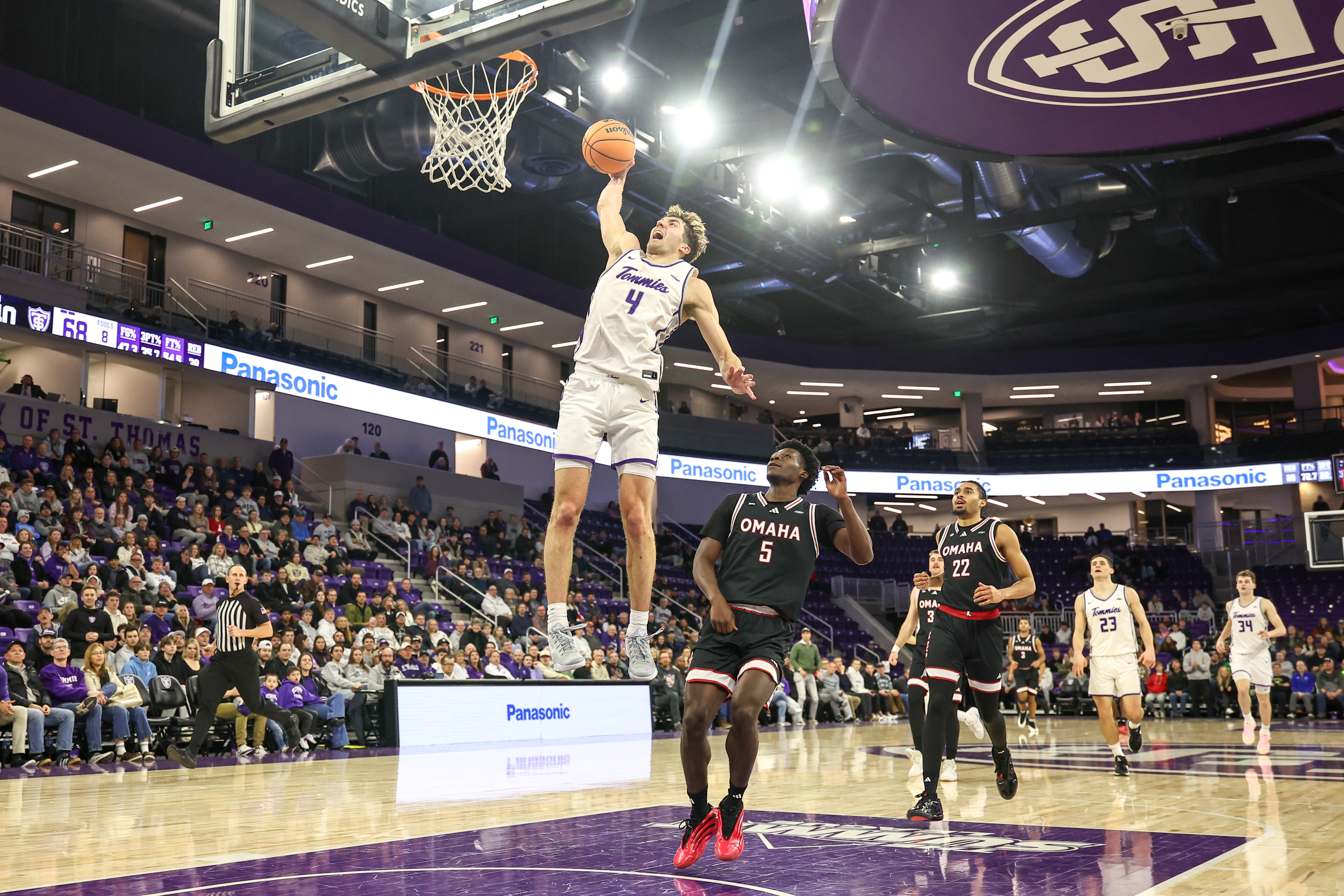 St. Thomas' Nolan Minessale (4) has the Tommies atop the Summit League Tournament odds, one of 31 tournaments highlighted in our college basketball conference tournament guide. 