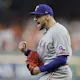 Nathan Eovaldi of the Texas Rangers celebrates an out against the Houston Astros, and we offer our top predictions for Game 1 of the World Series between the Diamondbacks and Rangers based on the best MLB odds.