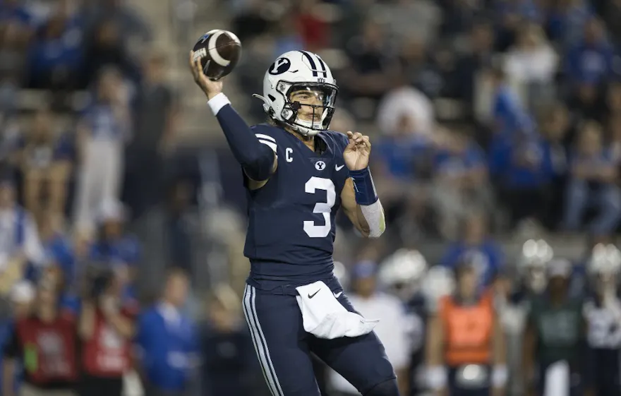 Jaren Hall of the Brigham Young Cougars throws a pass against the Wyoming Cowboys during the first half of their game September 24, 2022 at LaVell Edwards Stadium in Provo, Utah.