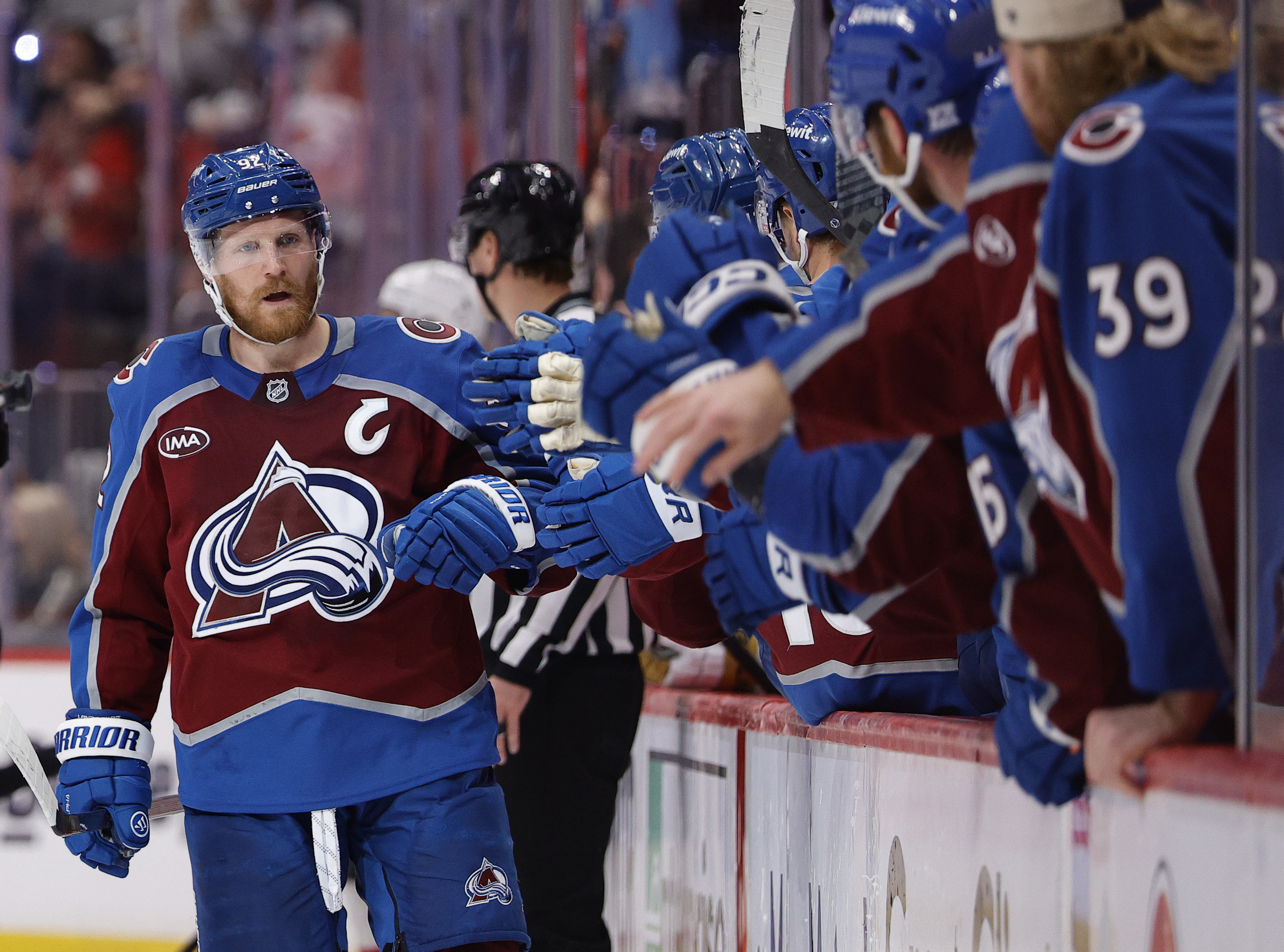 Colorado Avalanche left wing Gabriel Landeskog celebrates with teammates as we make our best Avalanche vs. Golden Knights prediction.