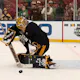 Boston Bruins goaltender Linus Ullmark makes a save as we look at the Vezina Trophy odds